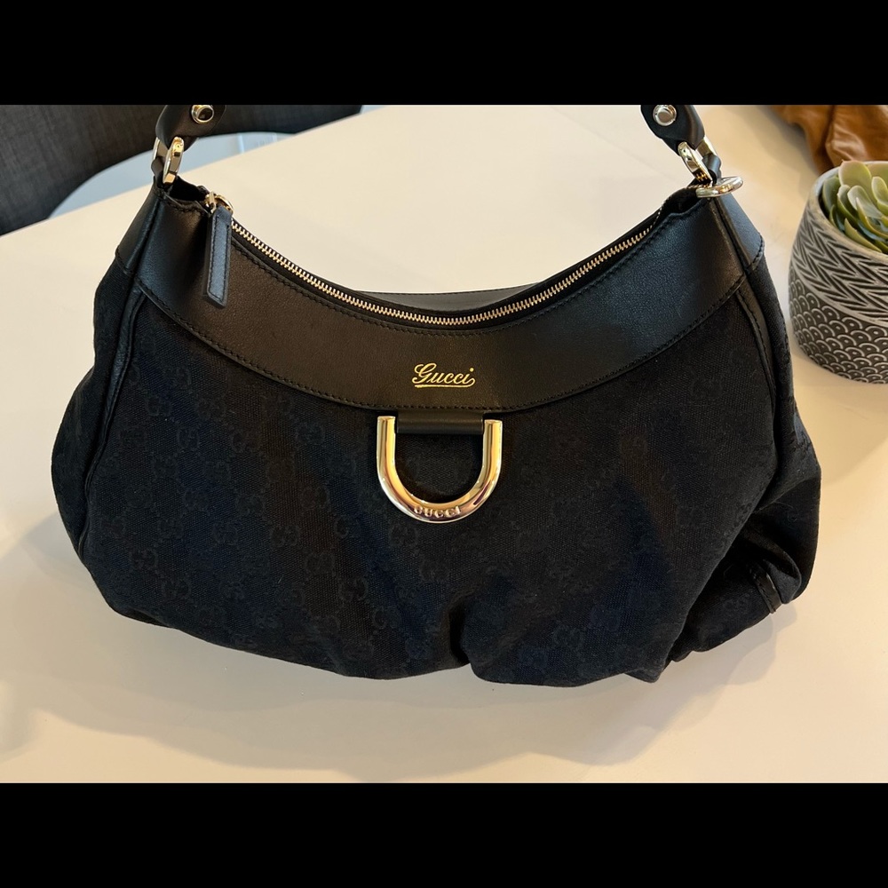 Gucci Black Hobo Bag with Gold Accents
